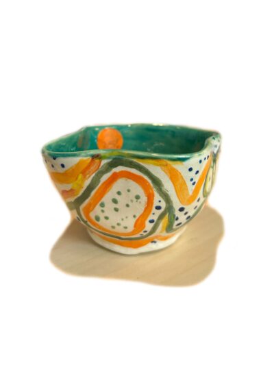<b>Title: </b>Hand made pottery pieces<br /><b>Artist: </b>Suki<br /><b>Description: </b>Various handmade earthenware pottery pieces, colourful underglazes and over glazes<br /><b>Medium: </b>Earthenware clay and glaze<br /><b>Price: </b>Ranging from $15 - $40 per piece <br />